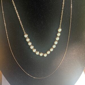 Elegant Gold and White Necklace